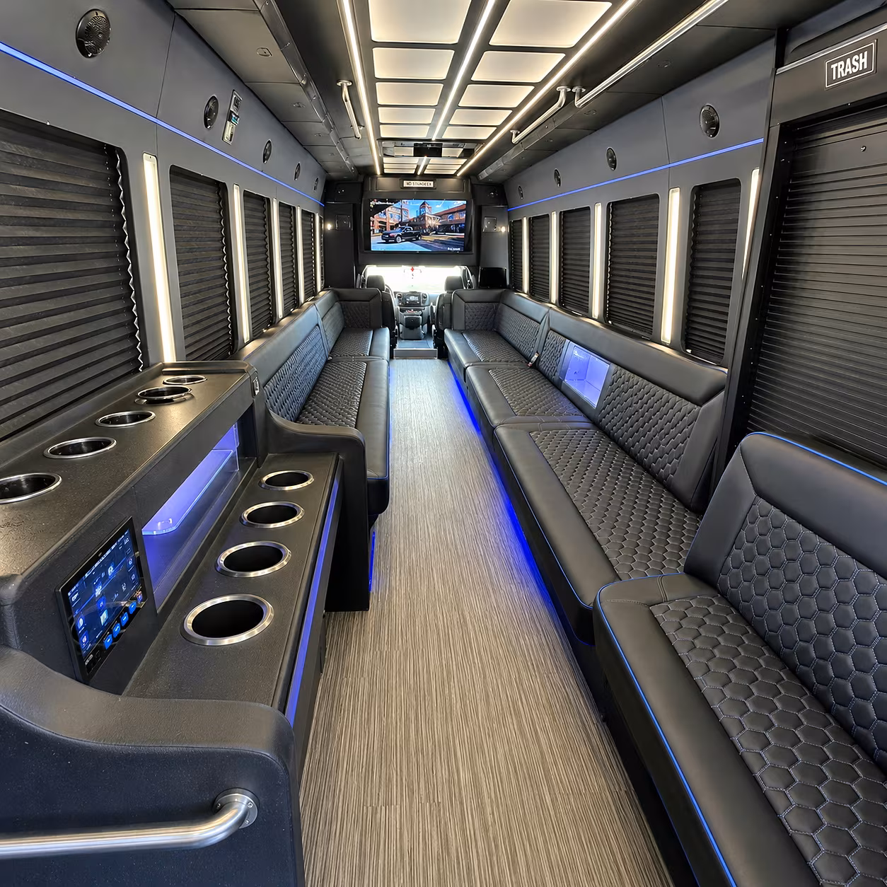 Group beside a Mercedes Sprinter limo in Tulsa