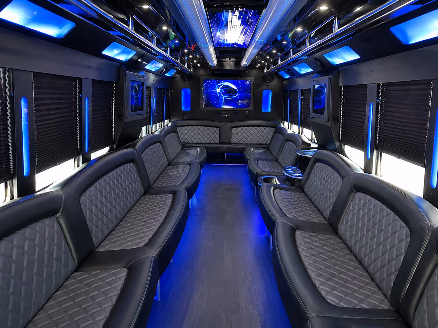 Wedding guests seated inside a party bus serving Tulsa